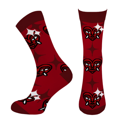 Illustration of red socks featuring a stylized heart with horns and fangs design, with white star accents.
